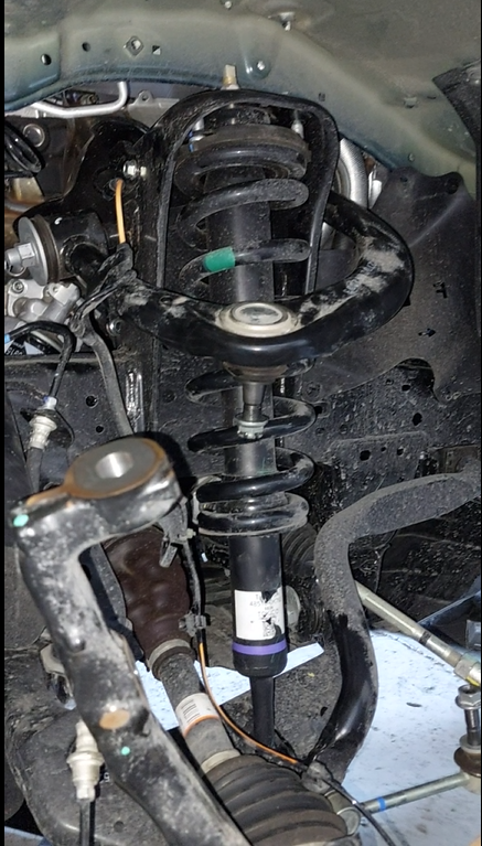 CAmbio de resortes y amortiguadores para Hilux